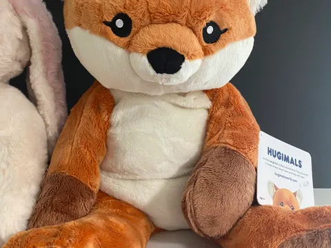 A Hugimals weighted plush fox stuffed animal on display at Mindspace Toys, part of our plush and cuddly toy selection.