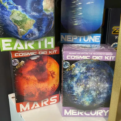 Cosmic Dig Kit space-themed STEM excavation kits on display at Mindspace Toys.